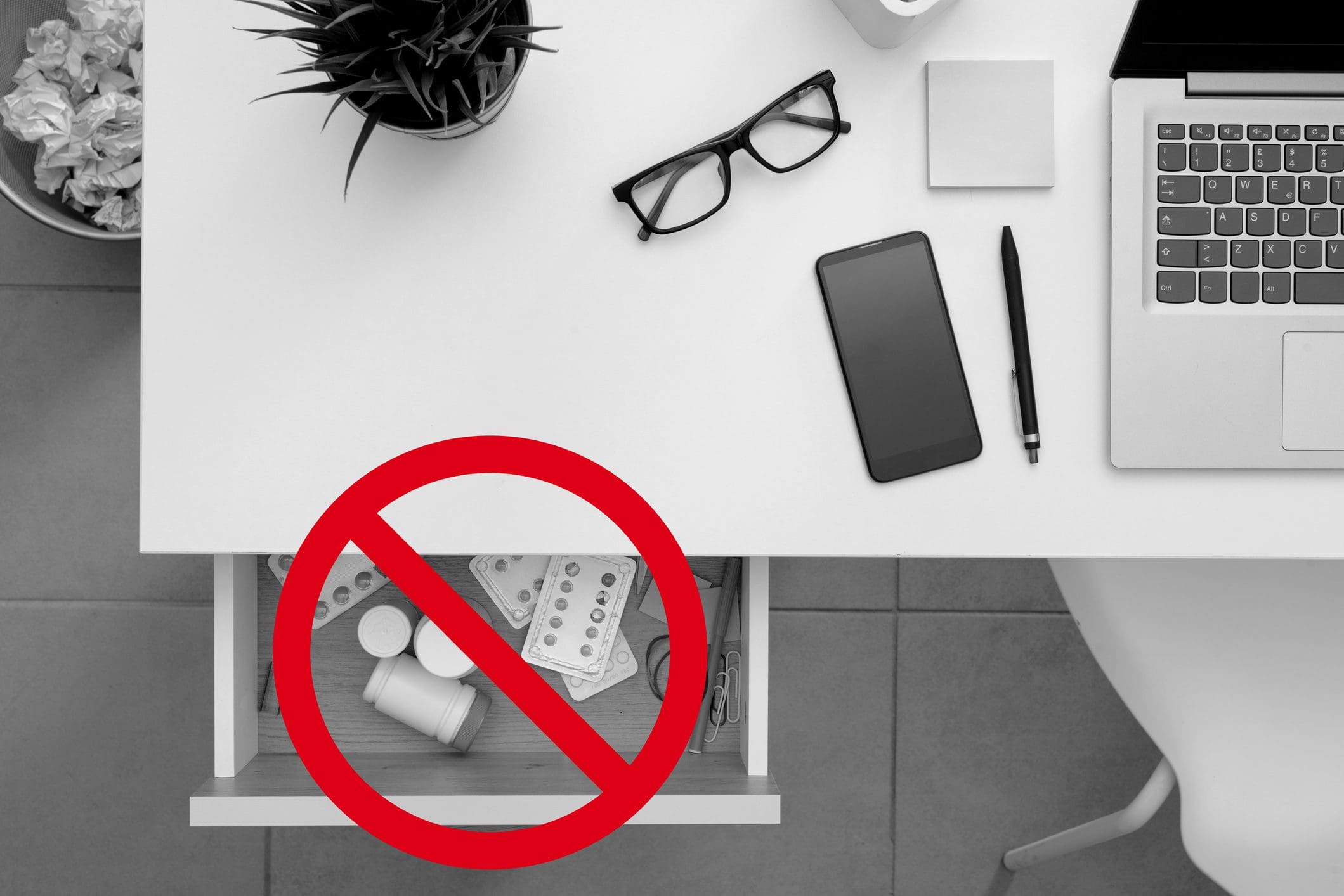 Desk with red prohibition symbol