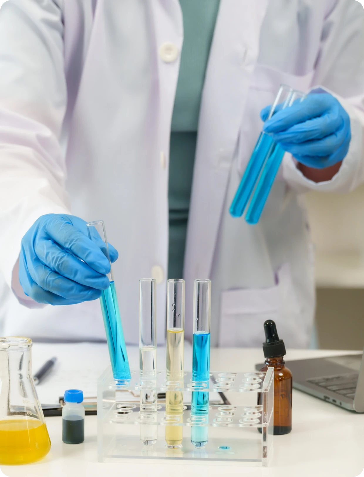 Researcher conducting chemistry experiment