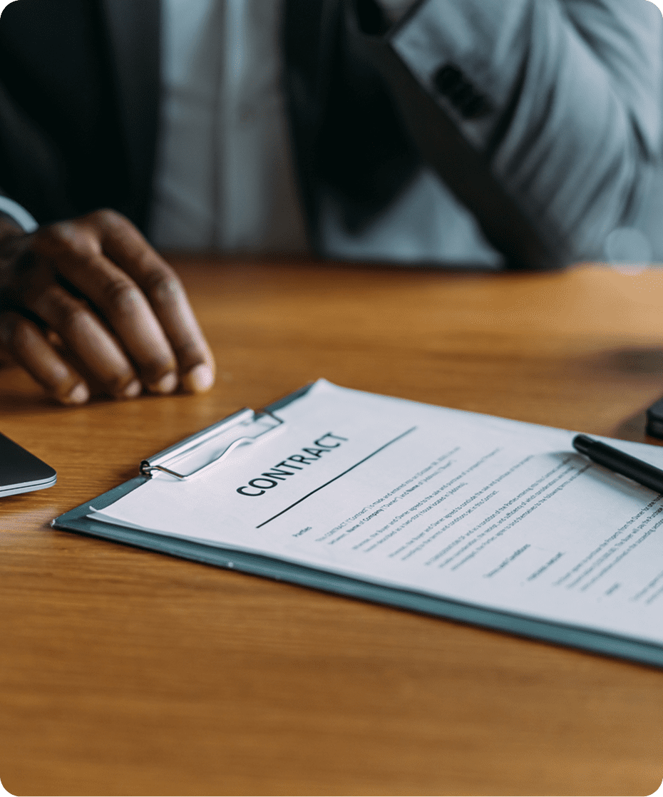 Business contract on wooden desk