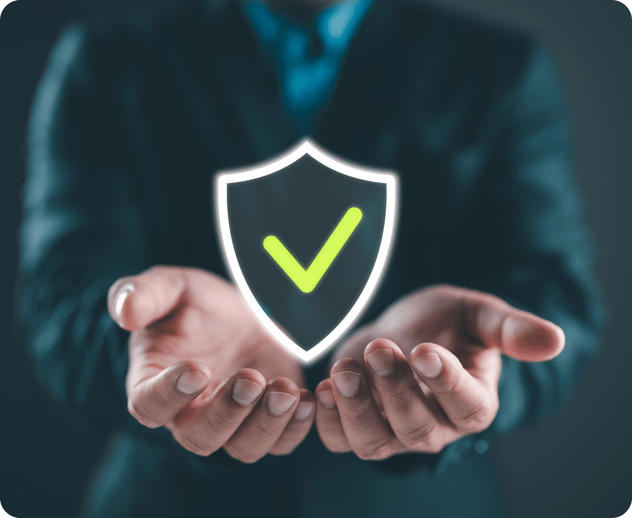 Hands holding a shield with checkmark
