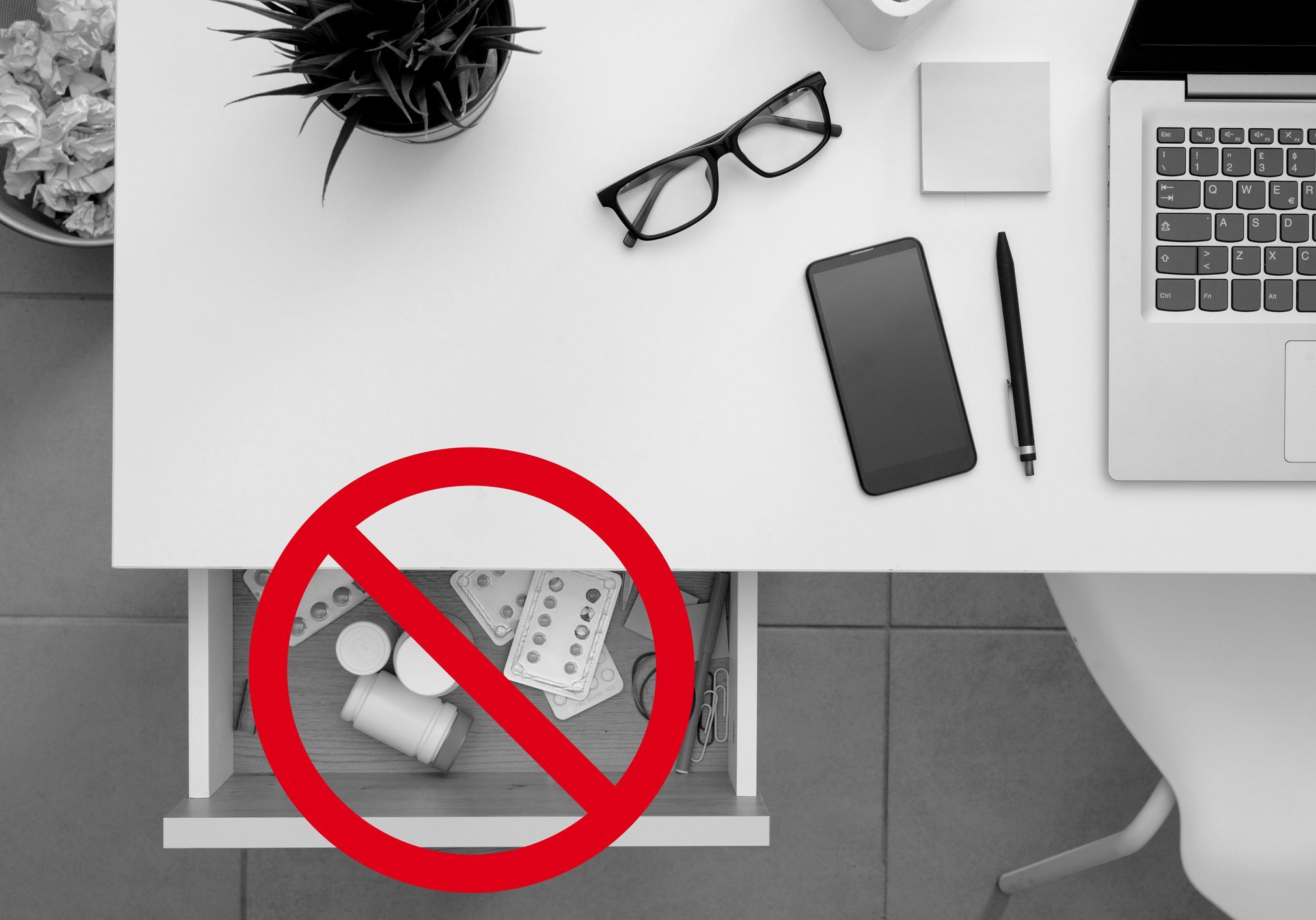 Desk with red prohibition symbol